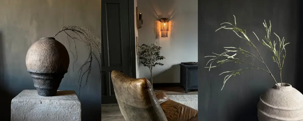 Rustig en sober interieur met natuurlijke takken en aardse potten als groendecoratie